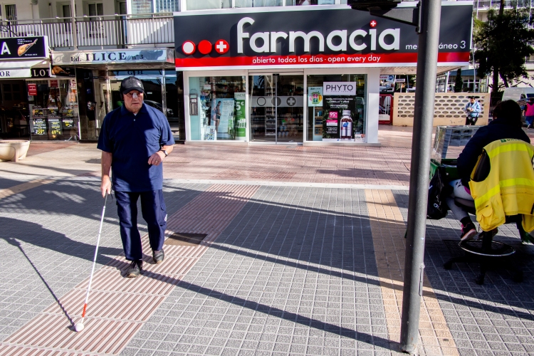 Street photography of a blind man in Benidorm, Spain.