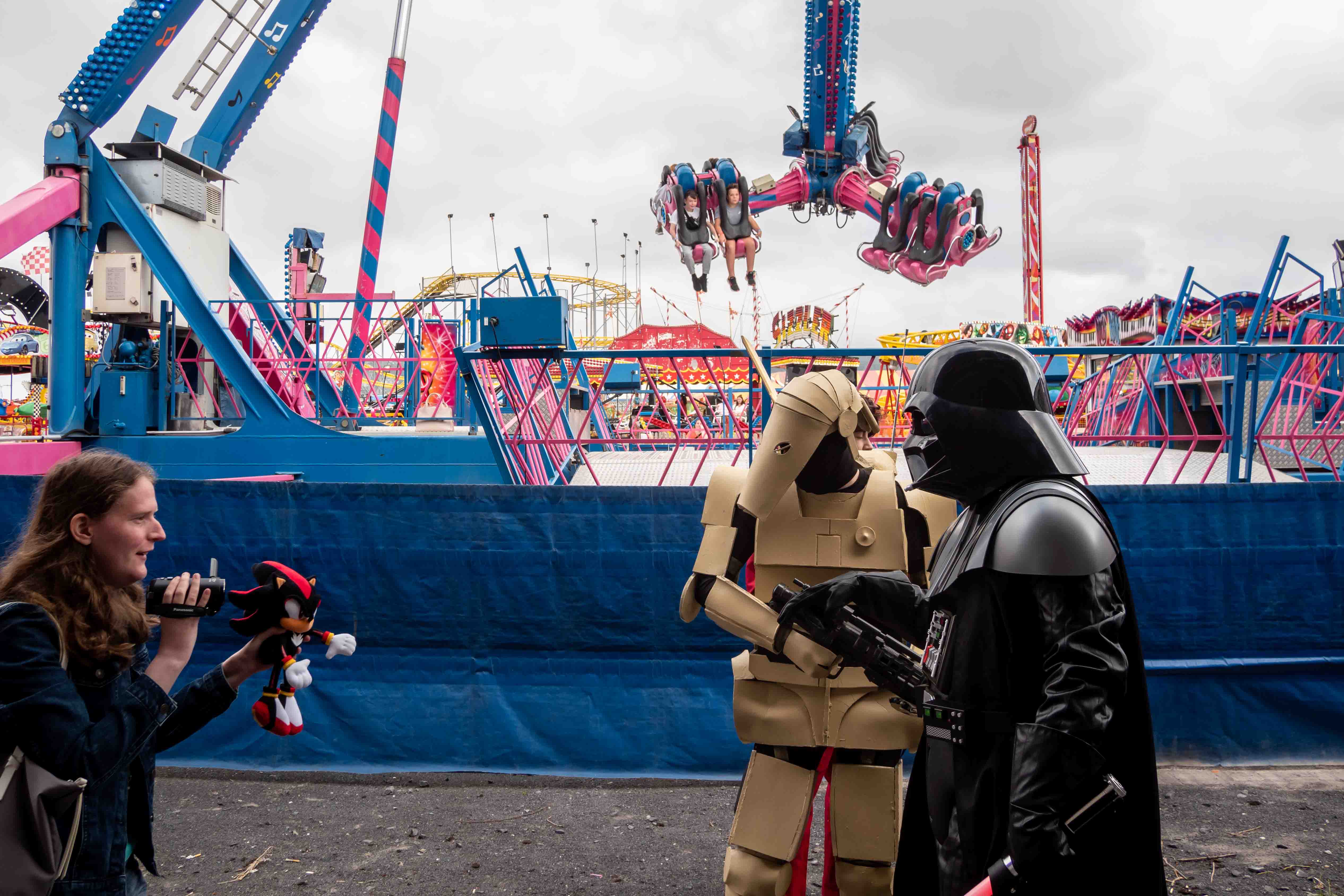 Street photography of Darth Vader in Funland in Weston-super-Mare, Somerset.